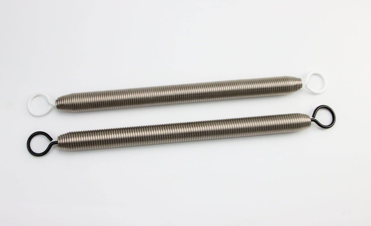 Top view of two Pilates Chair Springs Replacement for Balanced Body Equipment with color-coded hooks for tension identification in Pilates machines.