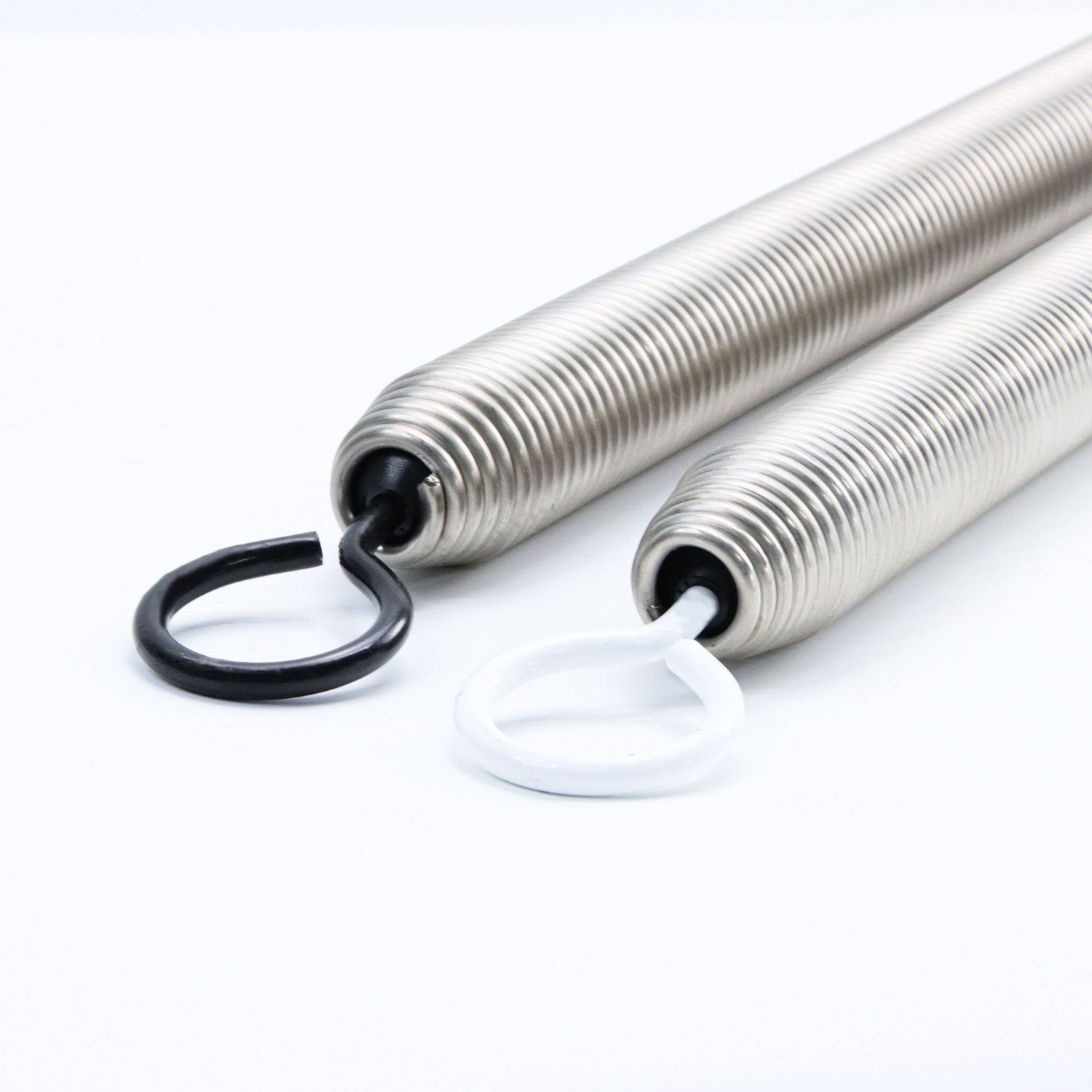 Side-by-side black and white hook ends of Pilates Chair Springs Replacement for Balanced Body Equipment, perfect for Pilates chair resistance training.